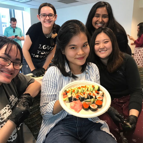 Honors Students show off their sushi-making skills