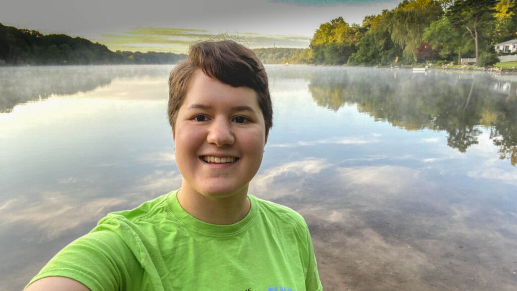 Shannon in front of a lake