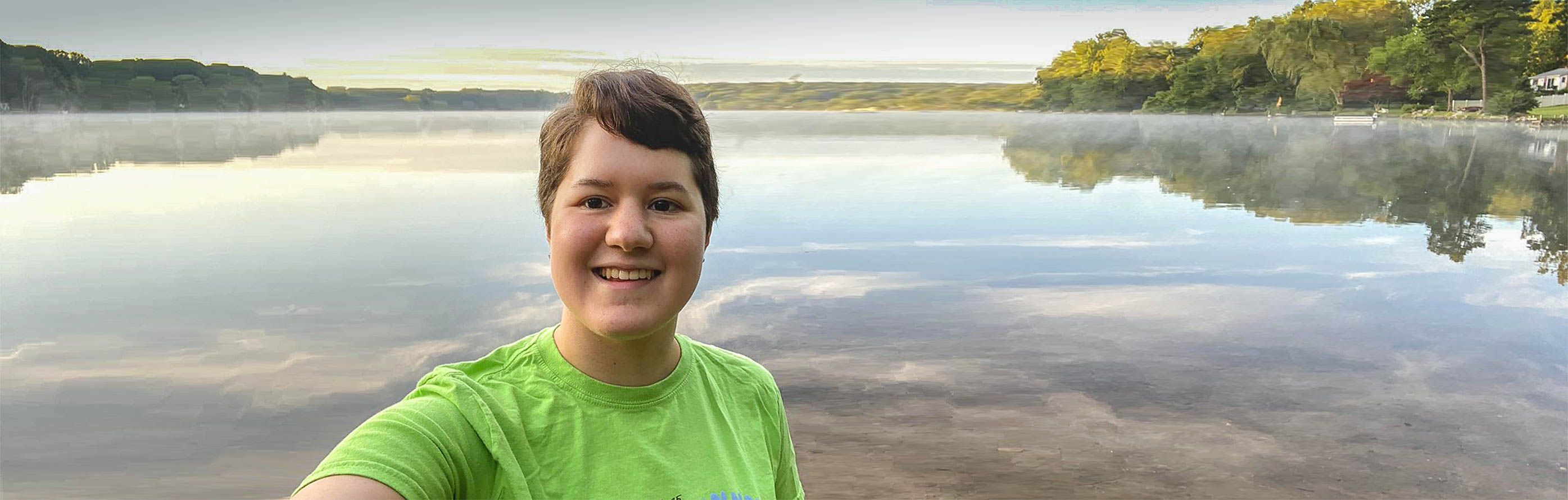 Shannon in front of a lake