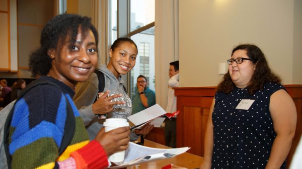 Students and faculty talk at SOURCE
